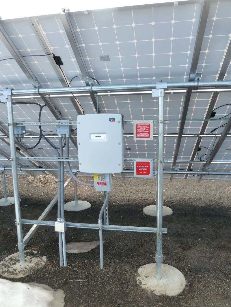 Grid tie inverter for the PV modules on this rack and on adjacent rack 