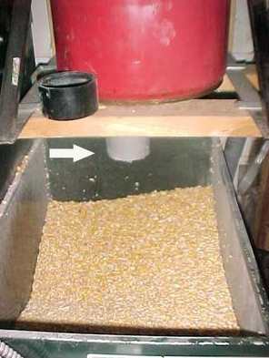 Corn transport system for a corn burner