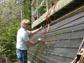 Installing the absorber plates in solar collector